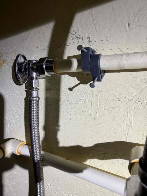 Installation of a new angle stop for fridge ice maker.