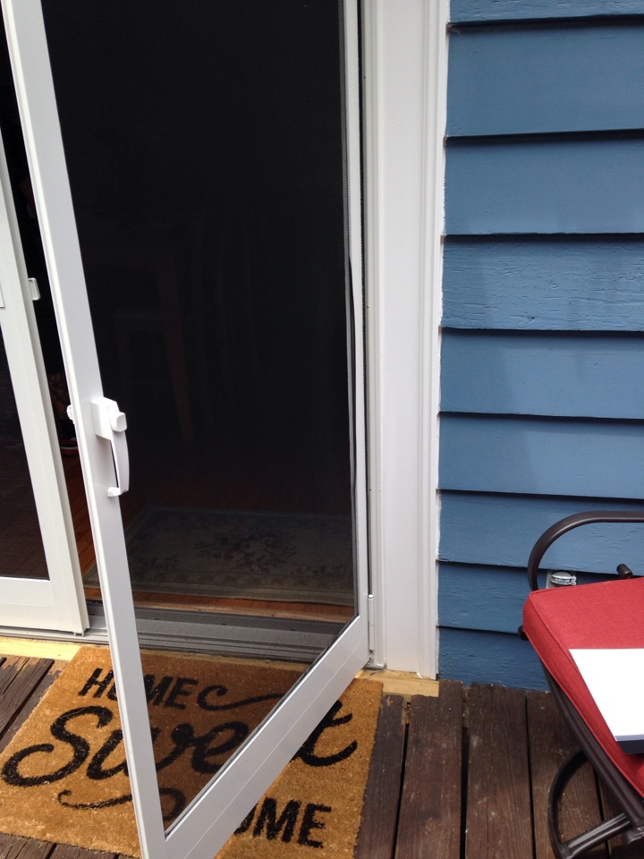 Worcester, MA - Renewal by Andersen Boston repairing screen door Worcester, MA - Renewal by Andersen Boston repairing screen door