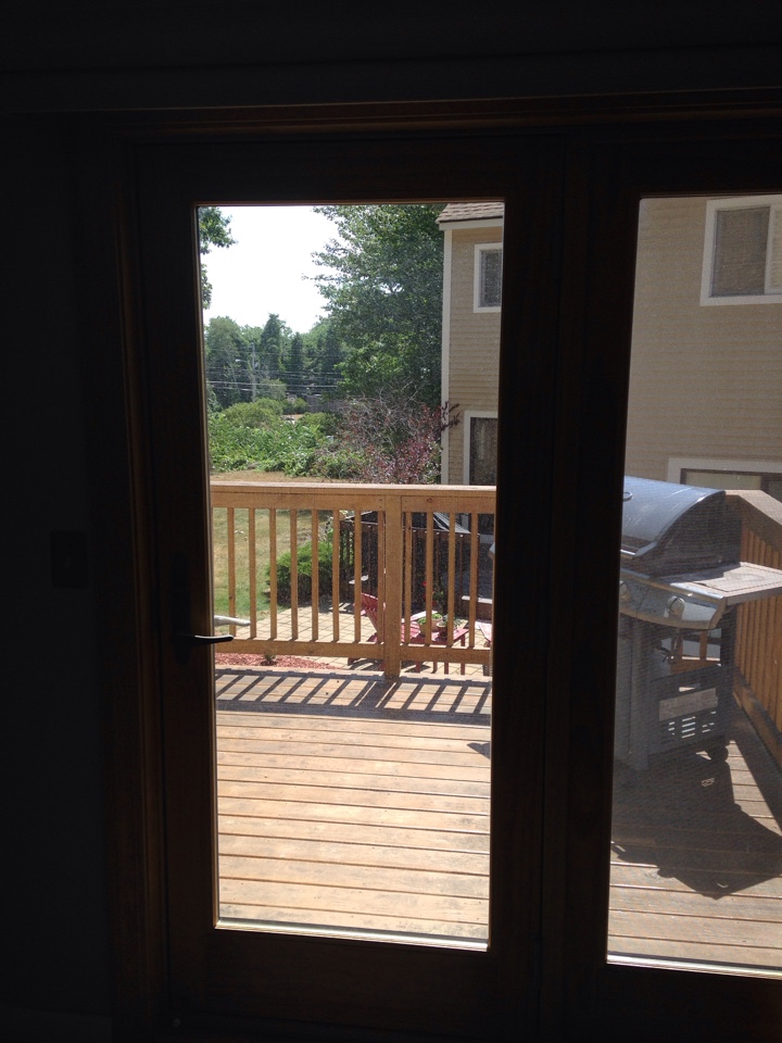Nashua, NH - Renewal by Andersen Boston adjusting Frenchwood hinged door Nashua, NH - Renewal by Andersen Boston adjusting Frenchwood hinged door