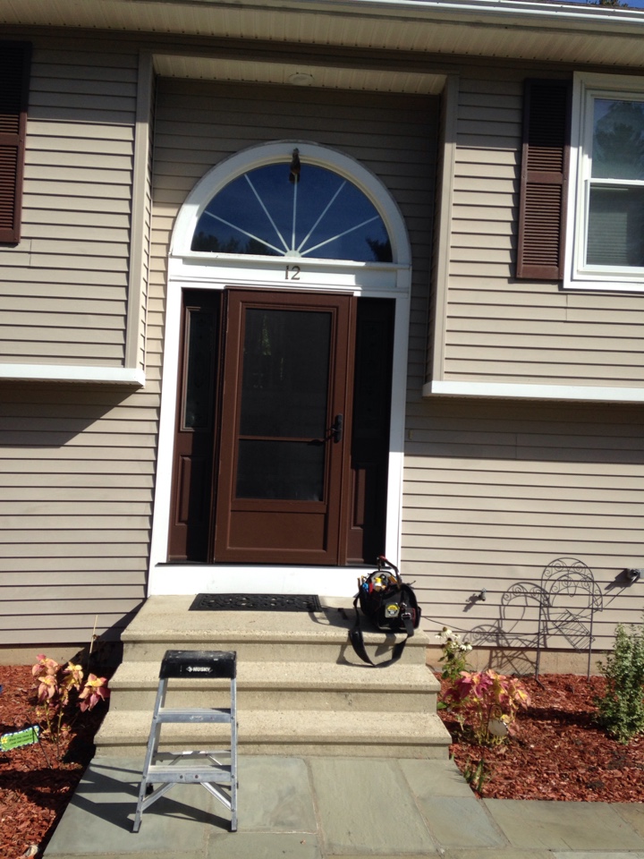 Shrewsbury, MA - Renewal by Andersen Boston adjusting storm door Shrewsbury, MA - Renewal by Andersen Boston adjusting storm door