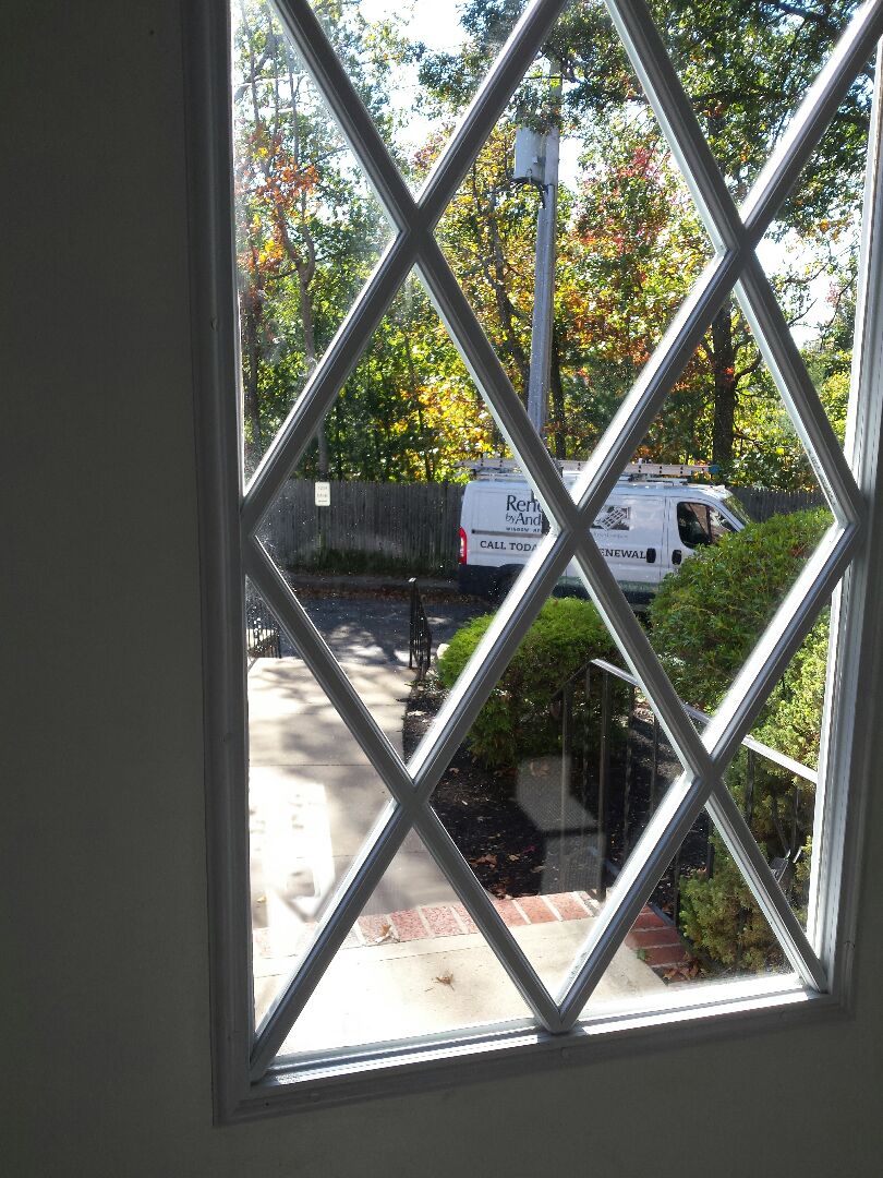 Plymouth, MA - Renewal by Andersen of Boston fixing a door Plymouth, MA - Renewal by Andersen of Boston fixing a door