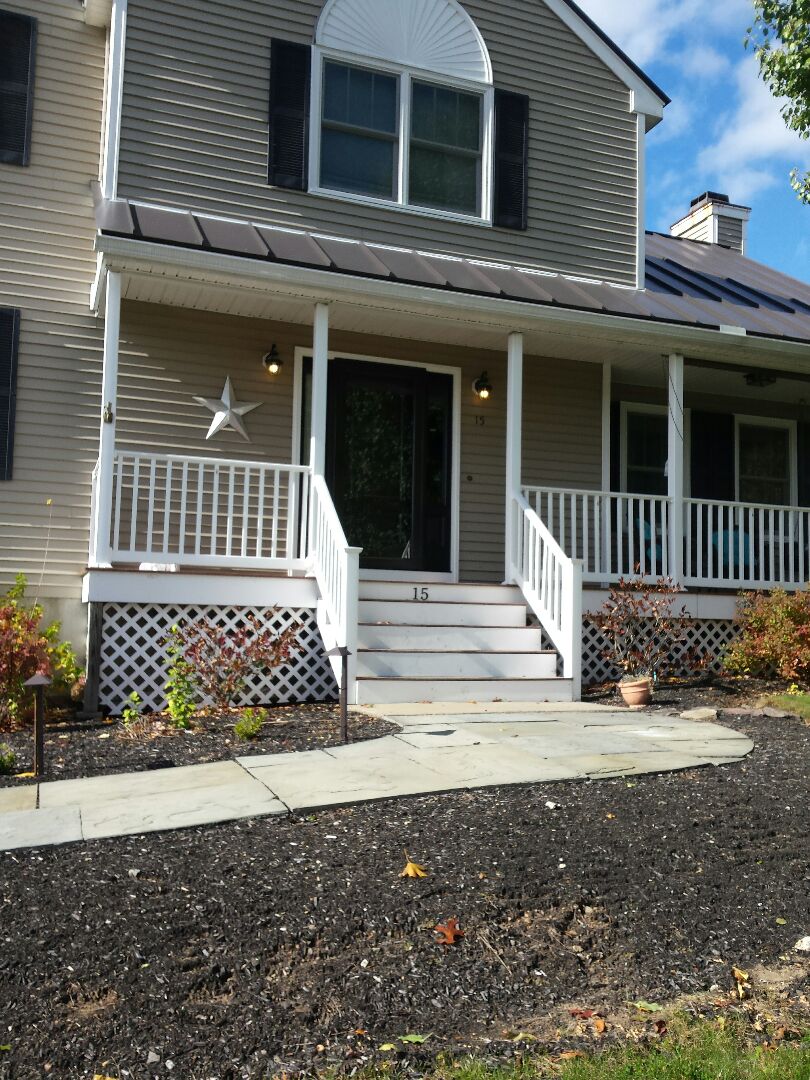 Worcester, MA - Renewal by Andersen of Boston installing a storm door Worcester, MA - Renewal by Andersen of Boston installing a storm door