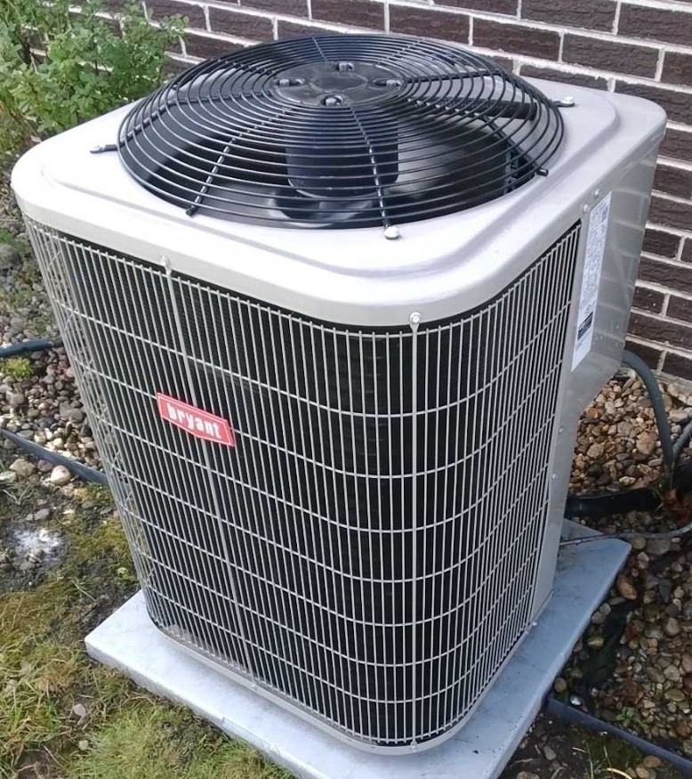 Roselle, IL - Completing the AC tune up on a newer air conditioning unt. Cleaning the outdoor coil and testing the equipment to ensure everything is operating correctly and efficiently. Roselle, IL - Completing the AC tune up on a newer air conditioning unt. Cleaning the outdoor coil and testing the equipment to ensure everything is operating correctly and efficiently.