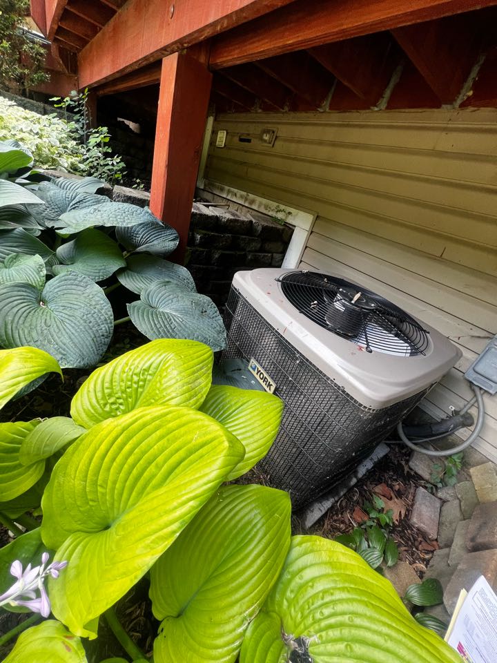 Hoffman Estates, IL - Performing annual AC clean & check on York unit. Taking pressure readings. Checking amp draw on fan motor. Hoffman Estates, IL - Performing annual AC clean & check on York unit. Taking pressure readings. Checking amp draw on fan motor.