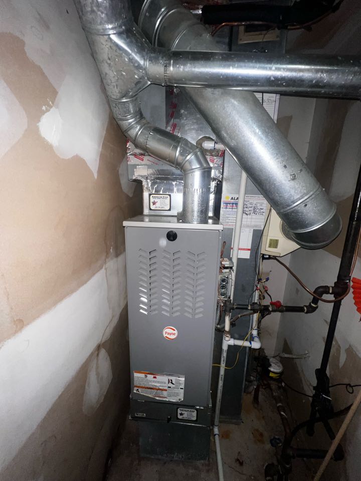 Schaumburg, IL - Performing annual furnace clean & check on Payne unit. Checking flame rectification & taking heat rise. Schaumburg, IL - Performing annual furnace clean & check on Payne unit. Checking flame rectification & taking heat rise.
