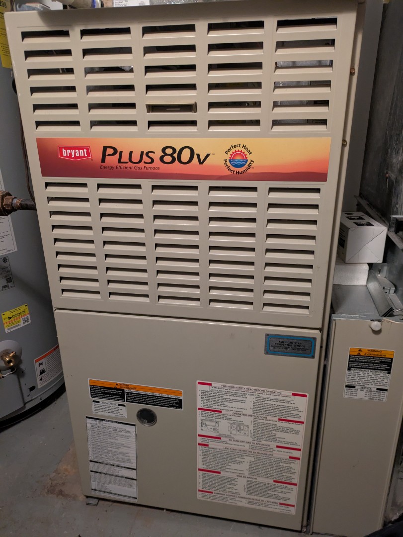 Roselle, IL - performing maintenance on a older Bryant furnace checking everything plus changing media filter  Roselle, IL - performing maintenance on a older Bryant furnace checking everything plus changing media filter