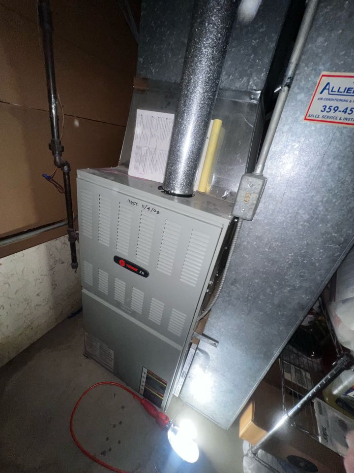 Des Plaines, IL - Performing annual furnace inspection. Checking air filter. Taking heat rise. Des Plaines, IL - Performing annual furnace inspection. Checking air filter. Taking heat rise.