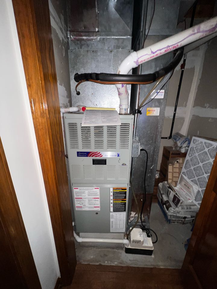 Bloomingdale, IL - Performing annual furnace clean & check on American standard unit. Replacing air filter. Replacing humidifier pad. Bloomingdale, IL - Performing annual furnace clean & check on American standard unit. Replacing air filter. Replacing humidifier pad.