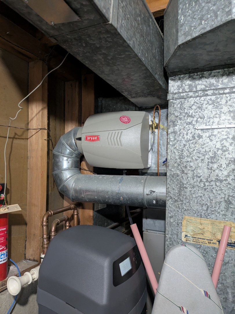 performing maintenance on a high efficiency Bryant system and humidifier  performing maintenance on a high efficiency Bryant system and humidifier