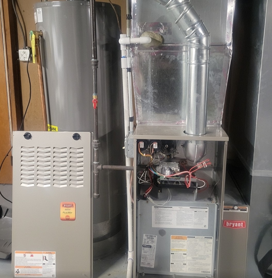 Elk Grove Village, IL - Completing the yearly cleaning and testing of the Bryant gas furnace. Changing the humidifier pad and testing for leaks. Also, installing an electronic air cleaner for improved air quality and dust control. Elk Grove Village, IL - Completing the yearly cleaning and testing of the Bryant gas furnace. Changing the humidifier pad and testing for leaks. Also, installing an electronic air cleaner for improved air quality and dust control.