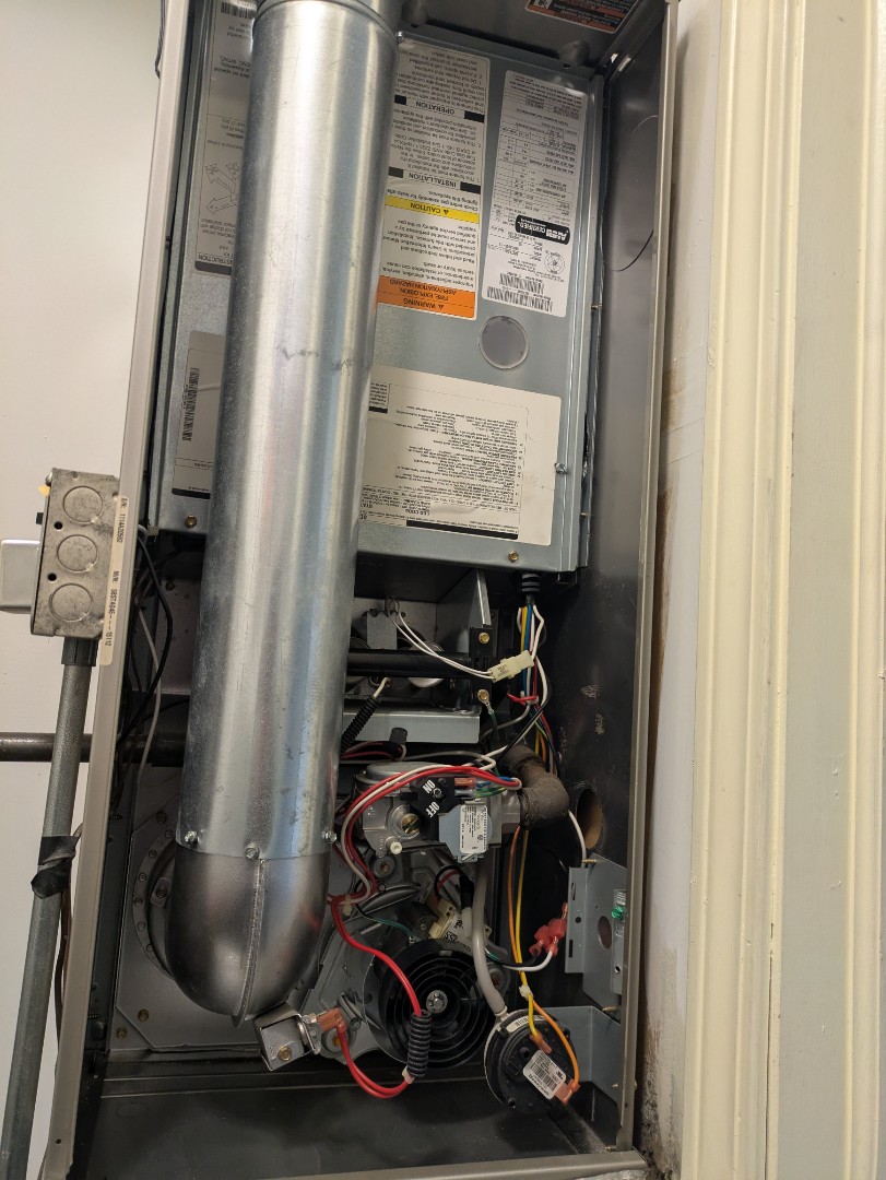 Schaumburg, IL - performing maintenance on a downflow furnace  Schaumburg, IL - performing maintenance on a downflow furnace