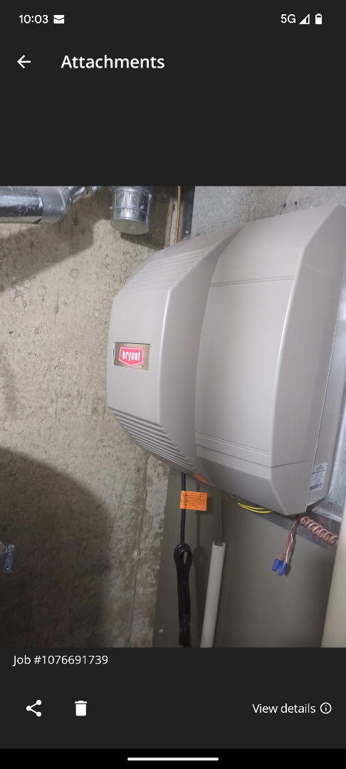 performing maintenance on a high efficiency Bryant system and large fan powered humidifier maintenance 