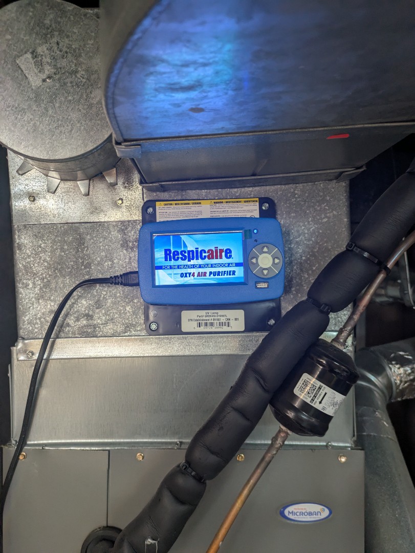 performing maintenance on a 6yr Rheem system and oxypure maintenance bulb replacement 