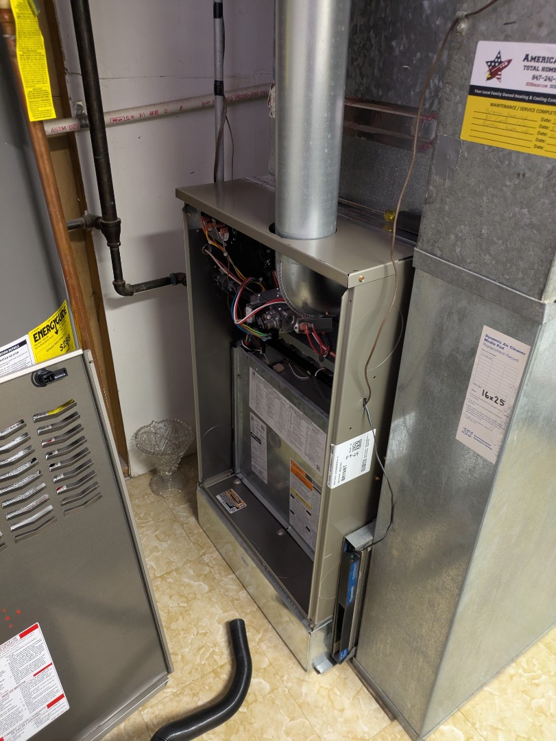 performing maintenance on a Bryant system and checking Rheem water heater 
