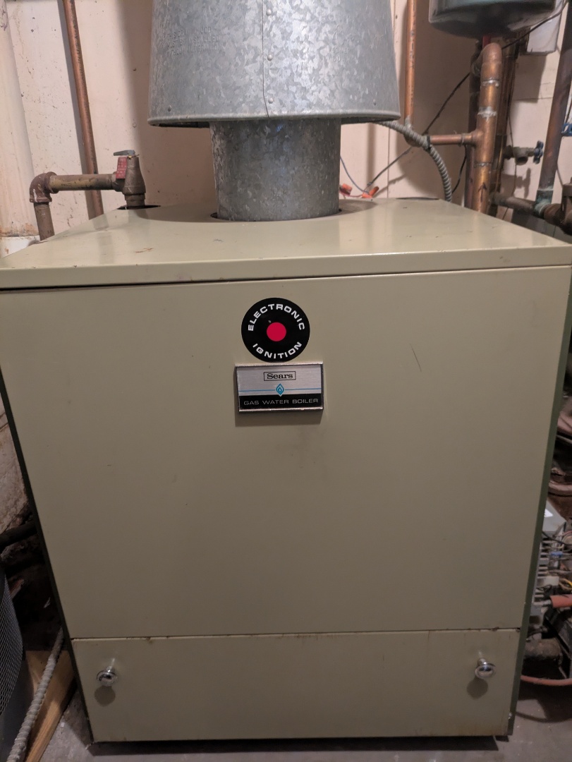 performing maintenance on a old Sears boiler and making recommendations 