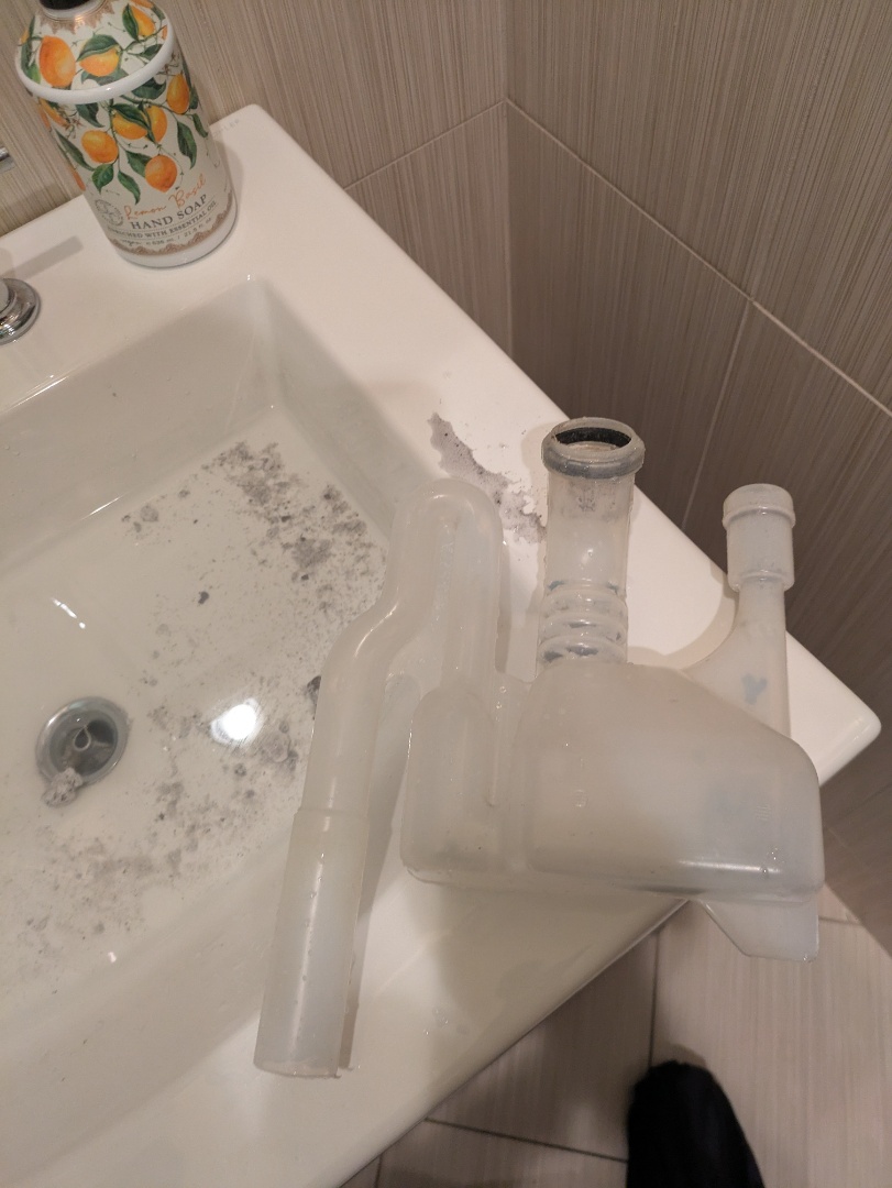 working on a high efficiency boiler system cleaning traps and checking operations 