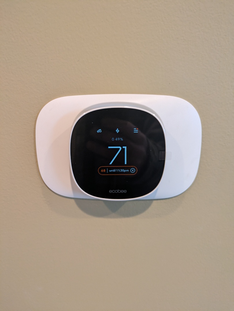 performing maintenance and installing 2 new smart thermostat 
