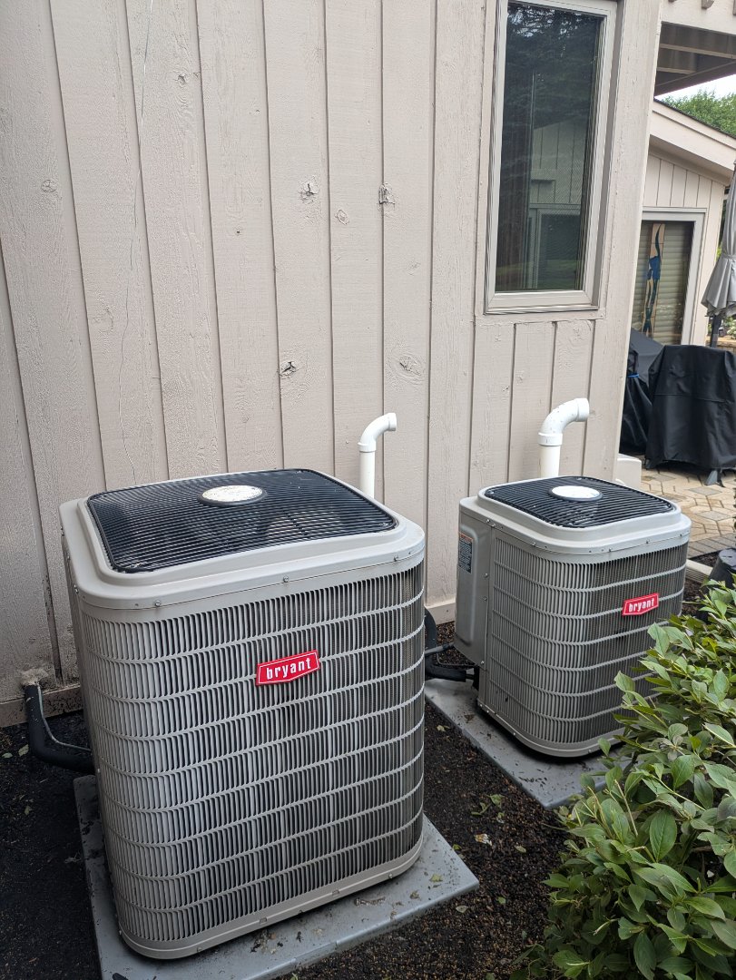 performing maintenance on two high efficiency Bryant system's 