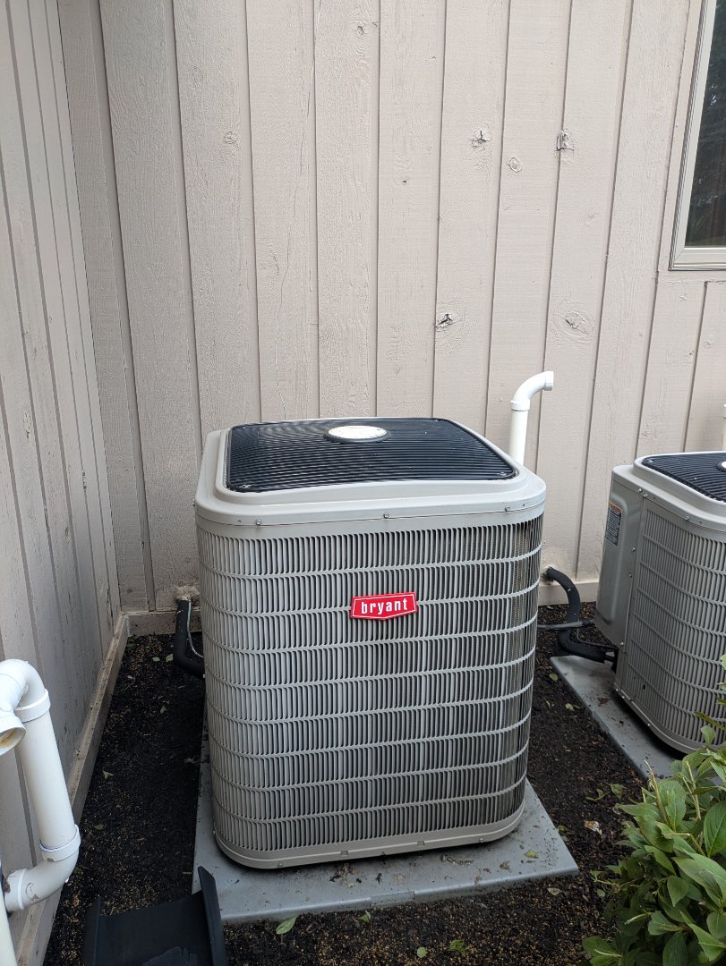 performing maintenance on two high efficiency Bryant system's 