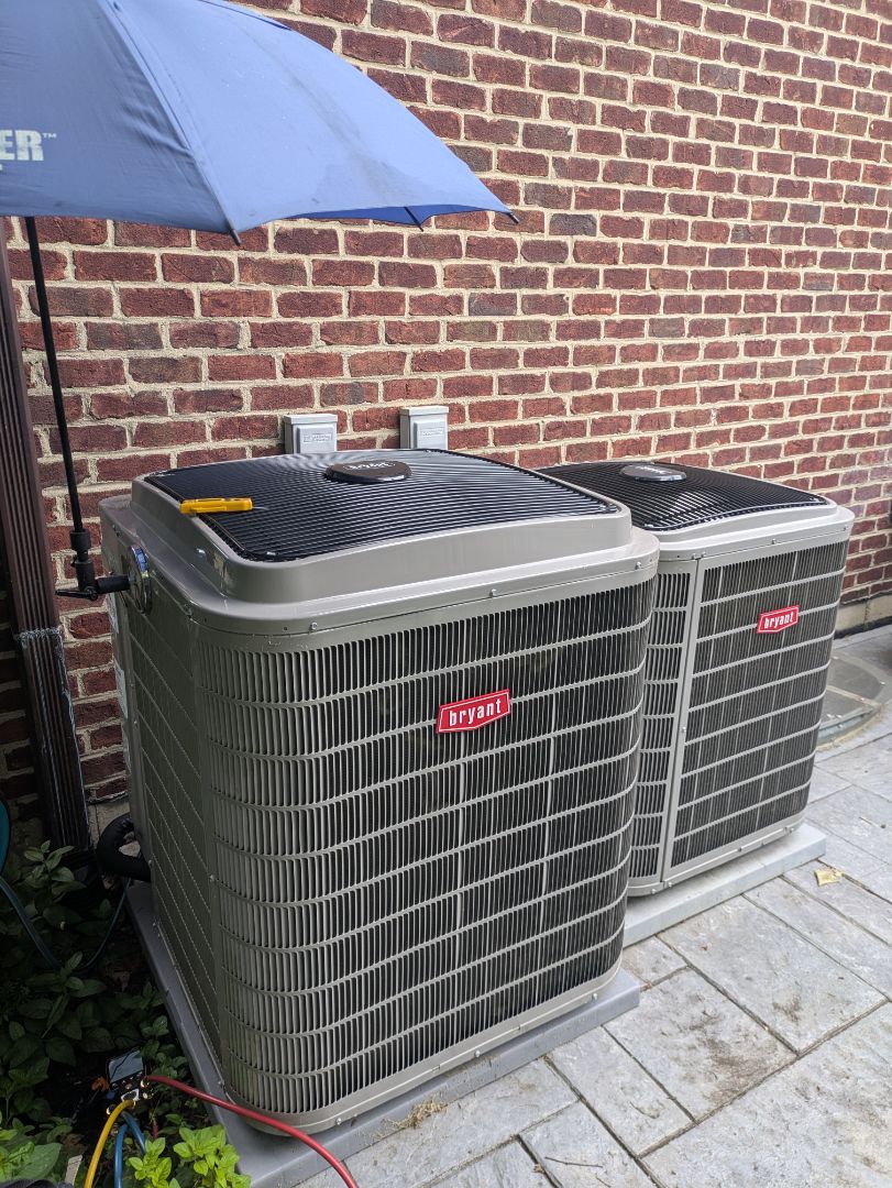 performing maintenance on two high efficiency Bryant heat pump system's 