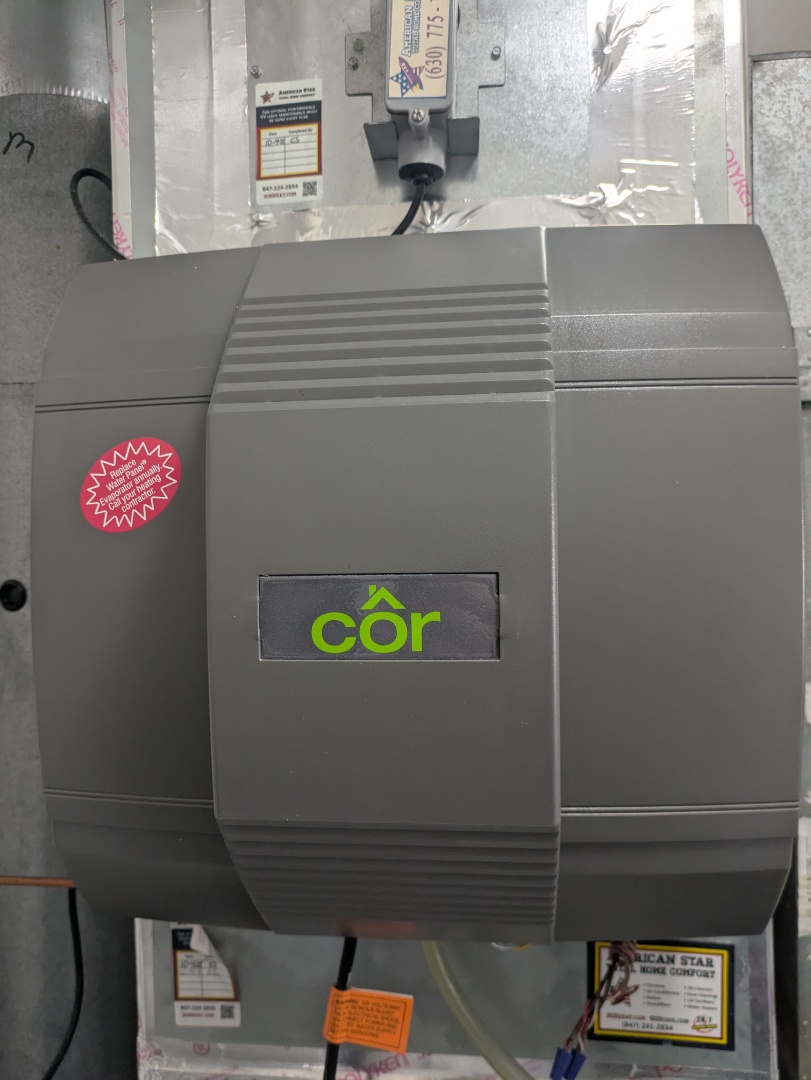 performing maintenance on a high efficiency Bryant system and flushing tank water heater 