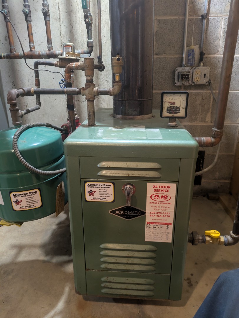 performing maintenance on a very old boiler, checking operations and zones 