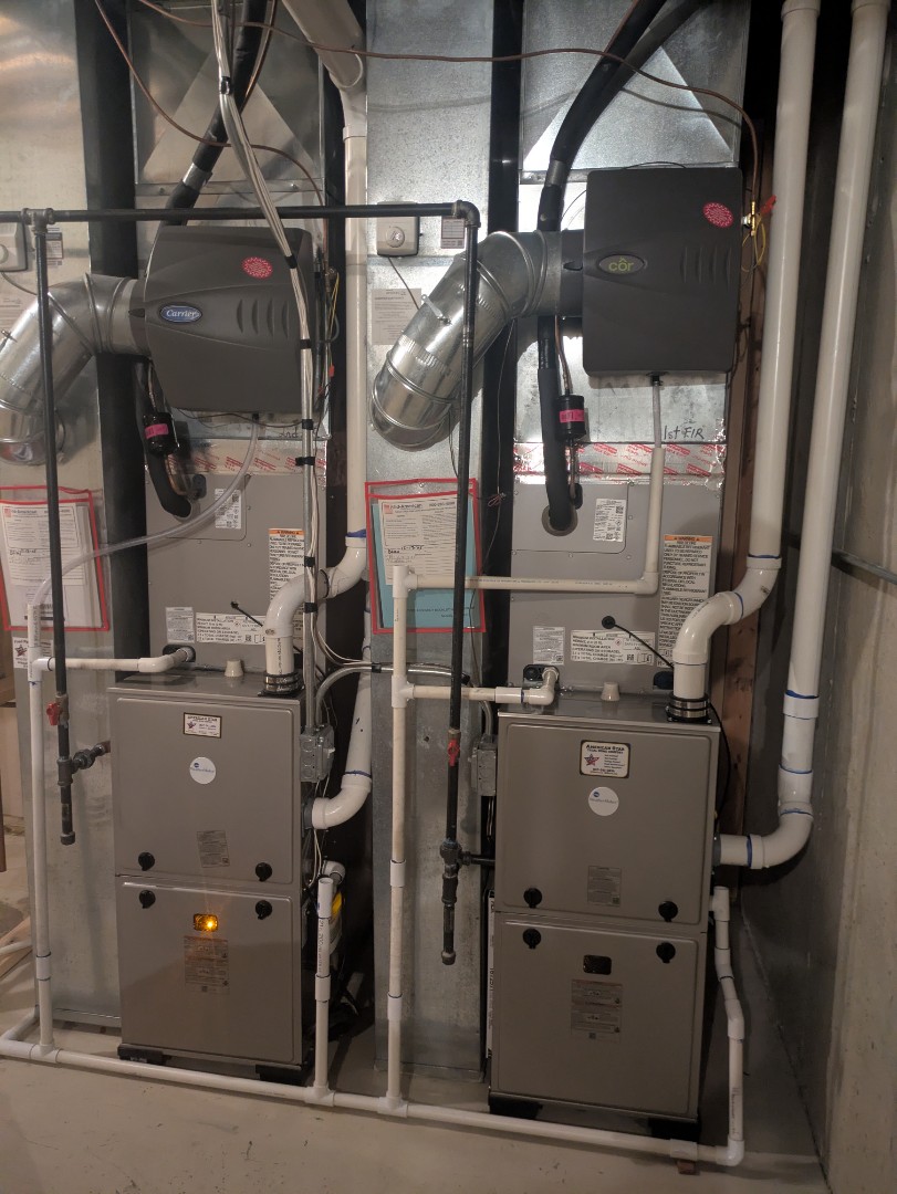 performing maintenance on two new high efficiency weather maker systems and humidifiers