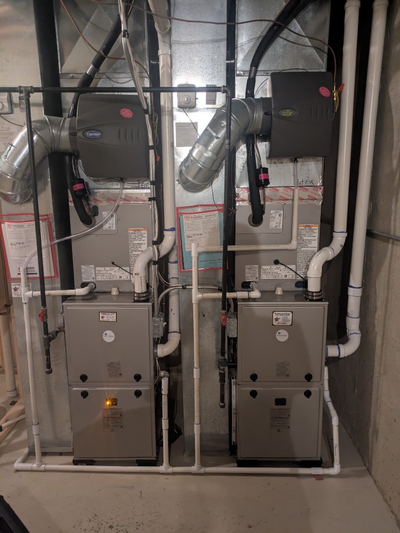 performing maintenance on two new high efficiency weather maker systems and humidifiers