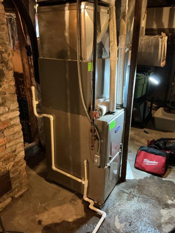 Performed spring maintenance tune-up on 5-year-old forced air furnace as requested by new homeowner. Inspected system components including thermostat functionality and verified proper operation of the unit located in basement. System is operating within normal parameters; established new customer account with preventative maintenance schedule.