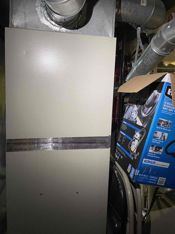 Conducted comprehensive evaluation of existing HVAC system for full replacement quote as requested by customer. Inspected current installation in basement utility room, which includes an aging furnace/air handler with complex metal ductwork configuration and flexible insulated ducting. Customer seeking complete heating, cooling, and in-home dehumidifier solutions with implementation timeline within one month.