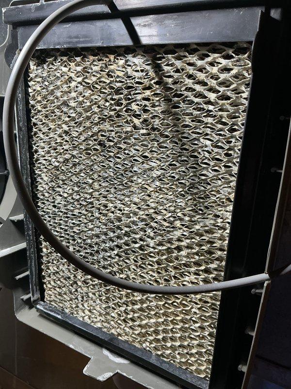 Performed annual preventive maintenance on residential HVAC system. Inspected and replaced the humidifier pad which showed significant discoloration and wear. Verified proper operation of furnace unit and associated ductwork connections after service was completed.