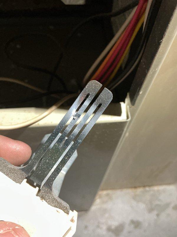 Diagnosed no-heat issue on natural gas forced air system. Inspected electrical connections and found damaged mounting bracket causing intermittent connection failure. Replaced faulty bracket and verified proper operation of ignition sequence, resulting in restored heat production with normal system cycling.