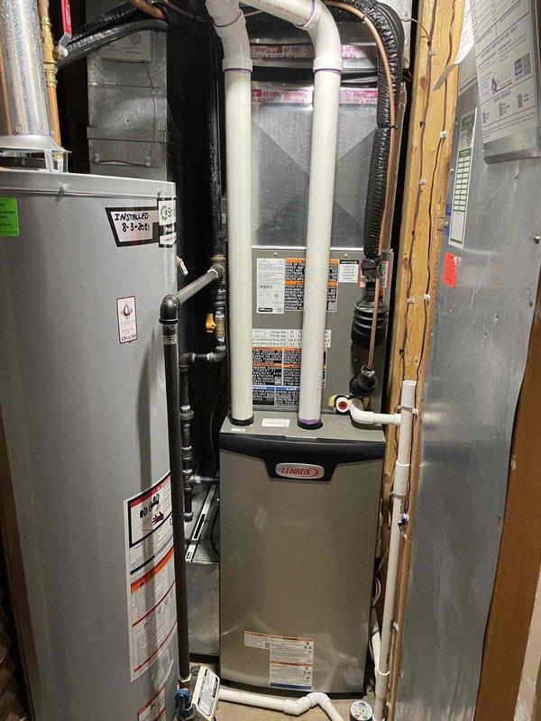 Successfully installed a complete HVAC system consisting of a 70,000 BTU furnace, 1.5-ton AC unit, and humidifier. All components were properly connected to existing ductwork, with PVC intake and exhaust vents routed through the structure according to manufacturer specifications and code requirements.