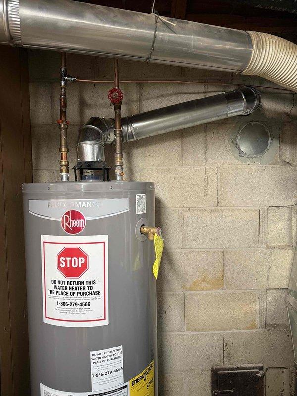 Completed installation of a complete HVAC system including a 70,000 BTU furnace, 2.5 ton AC unit, and humidifier. Installed new chimney liner with proper cap/vent pipe on rooftop and performed all necessary mechanical connections. System was fully tested and verified operational with all permits properly secured.