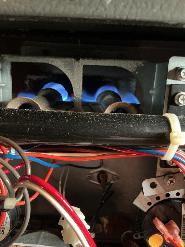 Responded to customer complaint of slow heating performance. Conducted diagnostic inspection of forced air furnace, examining burner assembly and electrical connections. Found normal flame pattern with proper combustion and no significant issues with heat exchanger or control wiring; recommended continued monitoring of system performance and possible thermostat calibration check if heating delays persist.