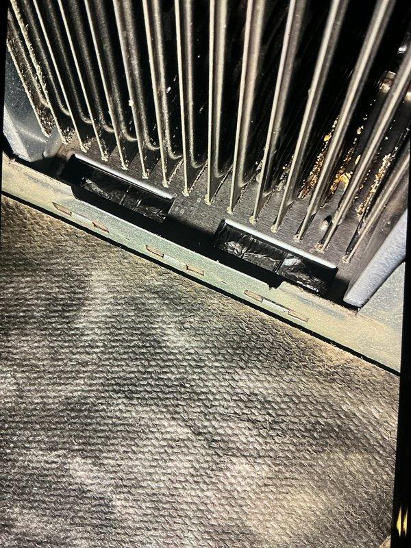Upon arrival, diagnosed inoperative blower on 19-year-old forced air furnace. Inspection revealed severe accumulation of debris and corrosion on heat exchanger fins, significantly reducing system efficiency. Cleaned accessible components and recommended system replacement due to age and condition of critical components.