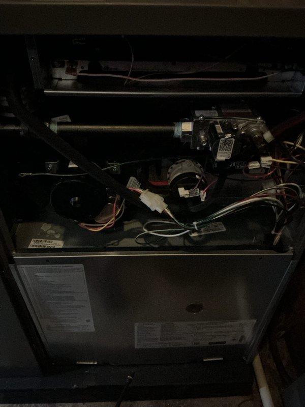 Performed annual heating maintenance on Rheem furnace system. Inspected interior components including wiring connections, blower assembly, and control mechanisms. Unit is functioning properly with no issues identified; system is ready for heating season.