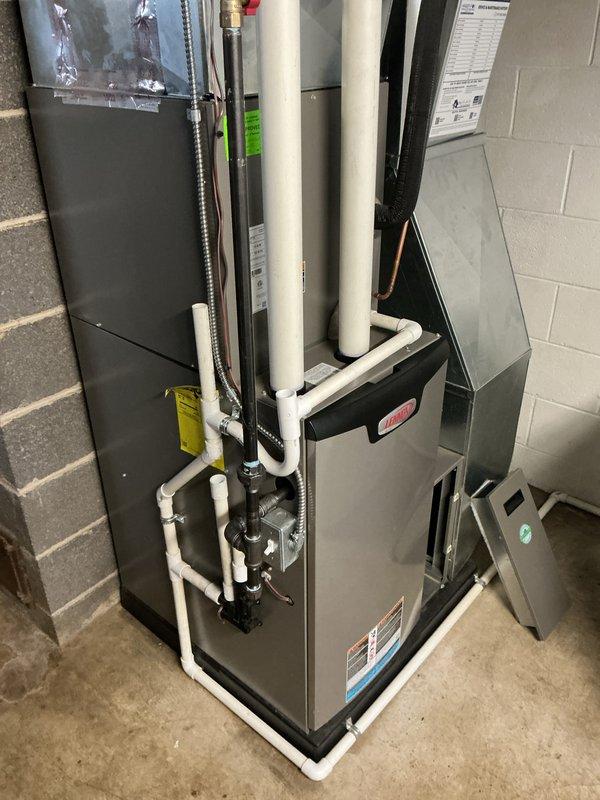 Performed scheduled Air Care Heating maintenance on Lennox furnace system. Inspected and verified proper functioning of Kidde CO detector (reading 0) and Sensi digital thermostat (set to 72°F). Examined furnace unit with PVC venting system, confirming all connections, gas line, and copper piping were secure and in good working condition.