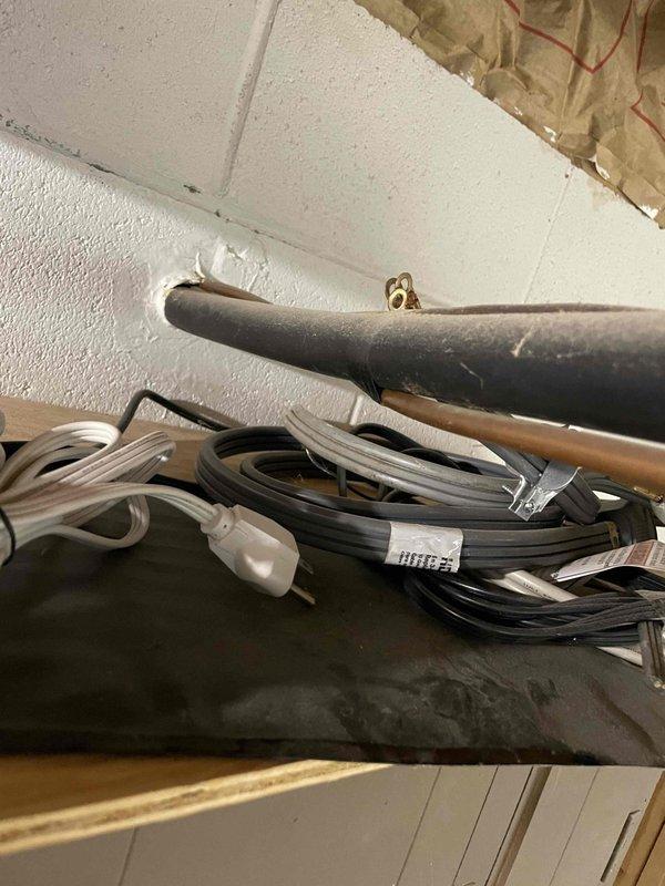 Conducted assessment for A/C replacement in basement with non-operational existing unit. Evaluated current ductwork, electrical connections, and condensate drainage system. Documented existing natural gas furnace configuration and determined appropriate tonnage requirements for colonial-style home. Prepared comprehensive replacement proposal for complete system upgrade.