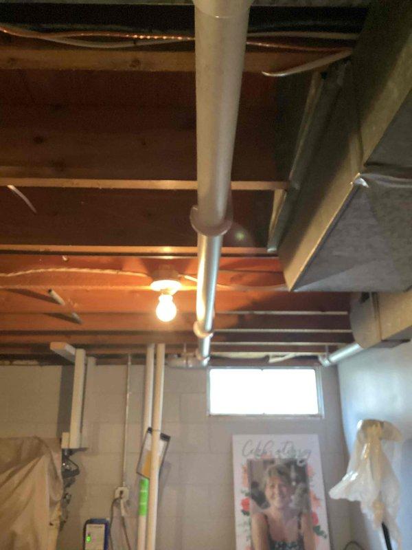 Completed installation of a complete Lennox HVAC system, including a 70,000 BTU furnace and 2-ton air conditioning unit with right-side configuration. System was properly connected to existing ductwork with new PVC venting installed according to code requirements, and all necessary permits were obtained prior to installation.