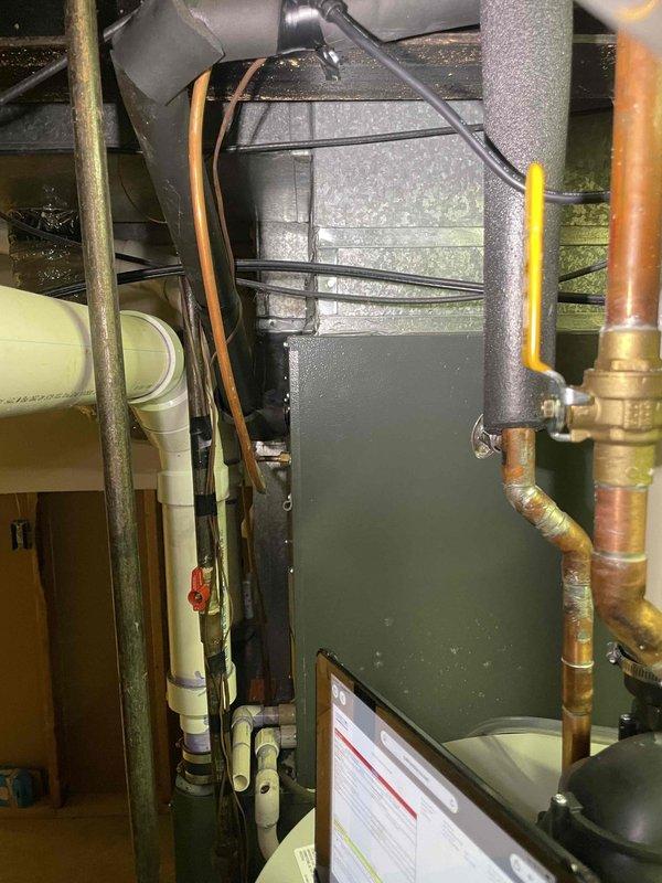 Conducted comprehensive inspection of failing 2004 Goodman HVAC system in 2,200 sq. ft. ranch home with full basement. Evaluated furnace with failed pressure switch and assessed existing ductwork, electrical panel capacity, and refrigerant lines. Recommended complete system replacement with option for bundled AC condenser upgrade to improve overall efficiency and reliability.