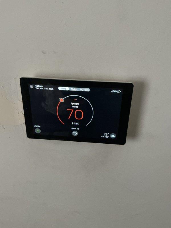 Performed annual furnace maintenance service on Lennox system with smart thermostat (set to 70° heat, Away mode). Conducted thorough inspection of ductwork using borescope camera to verify integrity and cleanliness of internal components. System operating at 32% capacity with normal function verified.