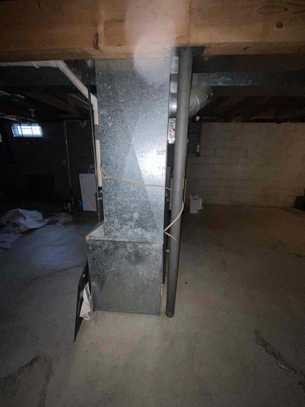 Conducted inspection of non-functioning furnace in basement and confirmed multiple holes in the primary heat exchanger, rendering the unit unsafe for operation. The aging system requires full replacement to restore heating functionality. Service credit applied to account.