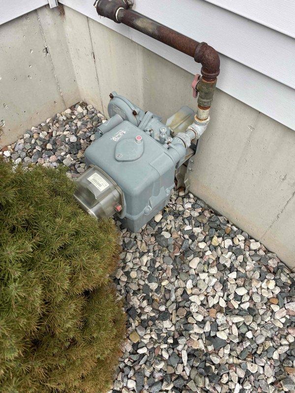 Conducted site assessment for new generator installation at residential property with no existing generator. Evaluated electrical service panel and gas meter setup, noting connection points and available infrastructure. Documented current outdoor plumbing configuration with gas regulator and interior electrical outlet setup for integration planning. Customer inquired about promotional installation offer; scheduled follow-up to provide complete installation estimate.