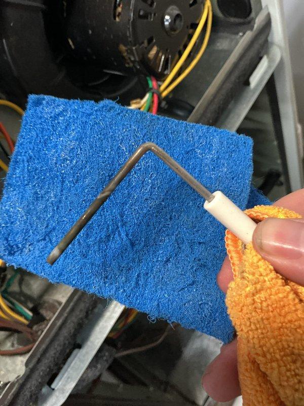 Performed comprehensive furnace tune-up on forced air system that was non-operational. Accessed internal components, inspected and cleaned blower assembly using specialized cleaning tools. Installed new humidifier as requested, verifying proper electrical connections to control board and ensuring all wiring (yellow, red, green, white) was correctly secured. System restored to proper working condition with both heating and humidity control functions operational.