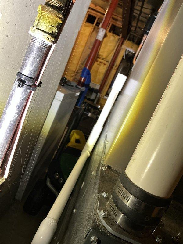 Performed annual furnace maintenance tune-up as part of customer's membership plan. Inspected water heater installation and associated plumbing components, checking gas control valve functionality and floor drain system. System confirmed to be operating properly with no issues identified during comprehensive preventative maintenance service.