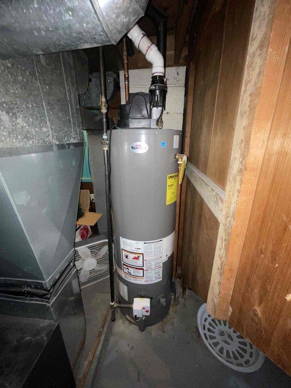 Conducted comprehensive assessment of 21-year-old natural gas furnace in customer's basement that is not functioning properly. Evaluation revealed aging system with standard metal ductwork configuration and visible wear. Provided replacement options under current Furnace & Air Conditioner promotion while customer is exploring competitive quotes and cash discount options.