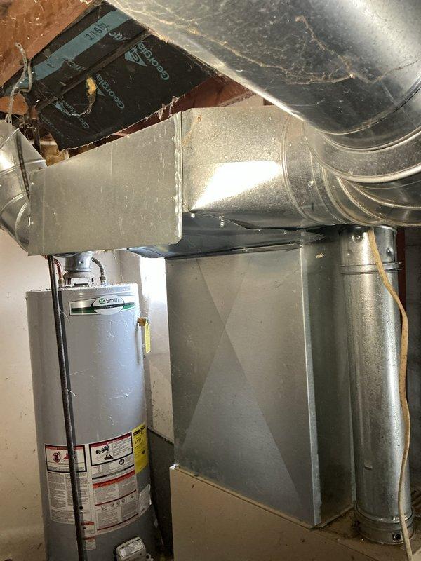 Responded to service call for Lennox furnace not producing heat despite blower operation. Diagnosed failed ignitor on 12-year-old system, replaced component and verified proper flame sequence. System now operating correctly with normal heat output and appropriate temperature rise.