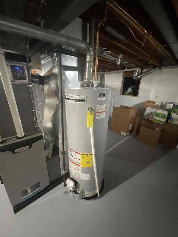 Conducted site assessment for new whole-home generator installation. Inspected existing gas meter and utility area in basement to evaluate connection possibilities. Documented current HVAC setup including water heater and furnace arrangement to determine optimal generator placement and integration requirements.