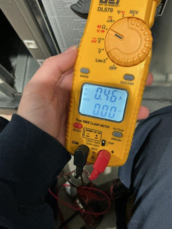 Completed annual heating maintenance on air handler unit. Installed new furnace filter and humidifier pad as scheduled. Electrical testing with multimeter confirmed system is drawing 0.46 amps, which is within normal operating parameters. All plumbing connections and water shutoff valve were inspected and found to be in proper working condition with no signs of leakage.